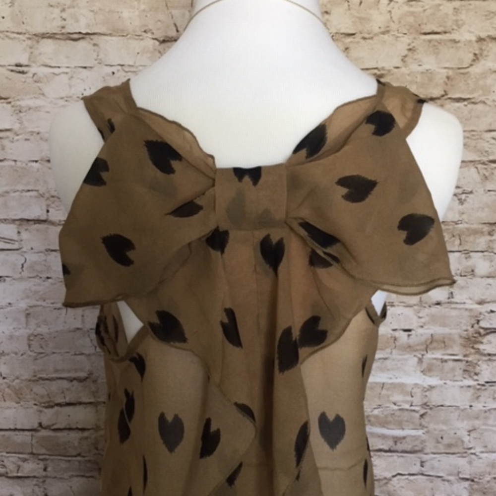 2/$20 This Sans Souci tank is all about the "exit"